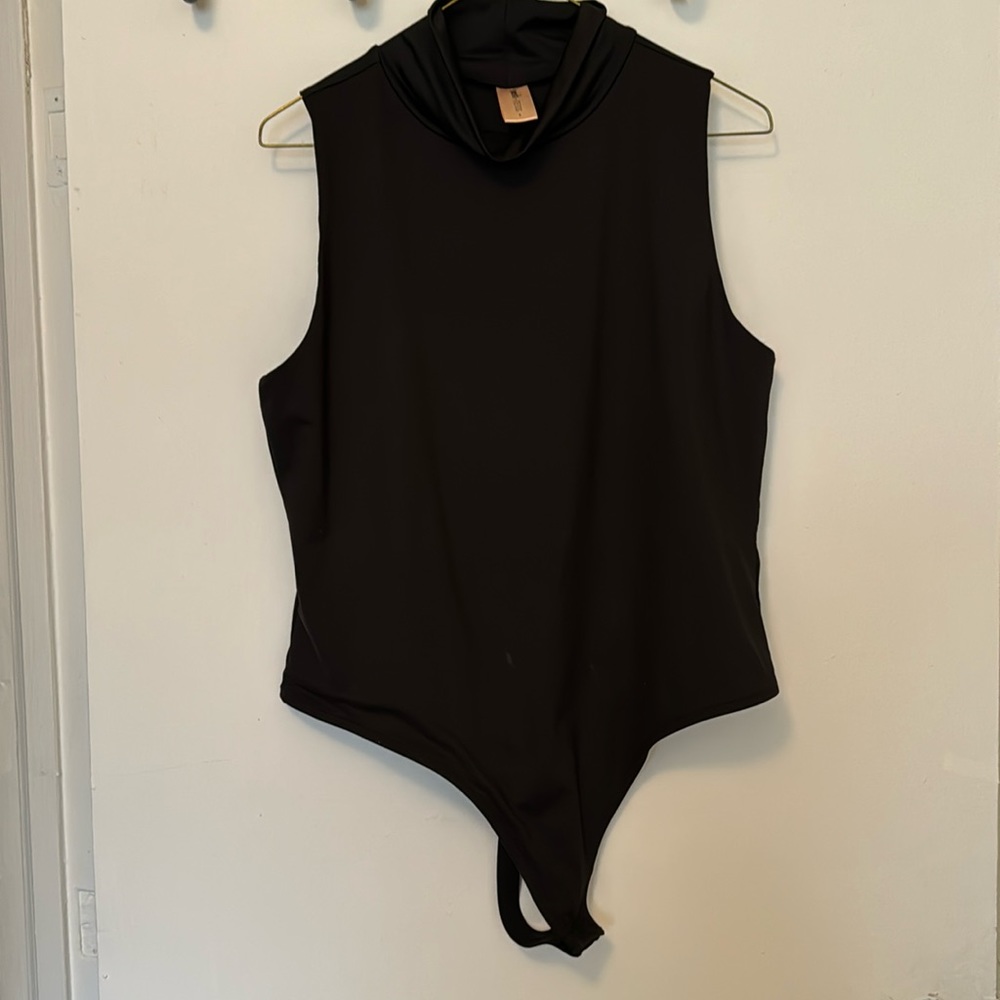Smash +TESS bodysuit